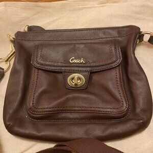 Coach brown glove leather small  Turn Lock Pocket Swingpack Crossbody Bag F45012